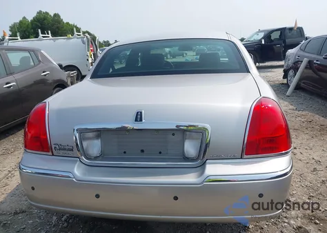 2011 Lincoln Town Car Signature Limited из США, поврежденный, VIN 2LNBL8CV1BX755986